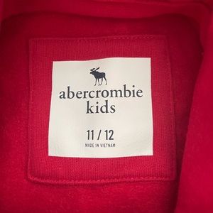 Red Abercrombie Kids hoodie.